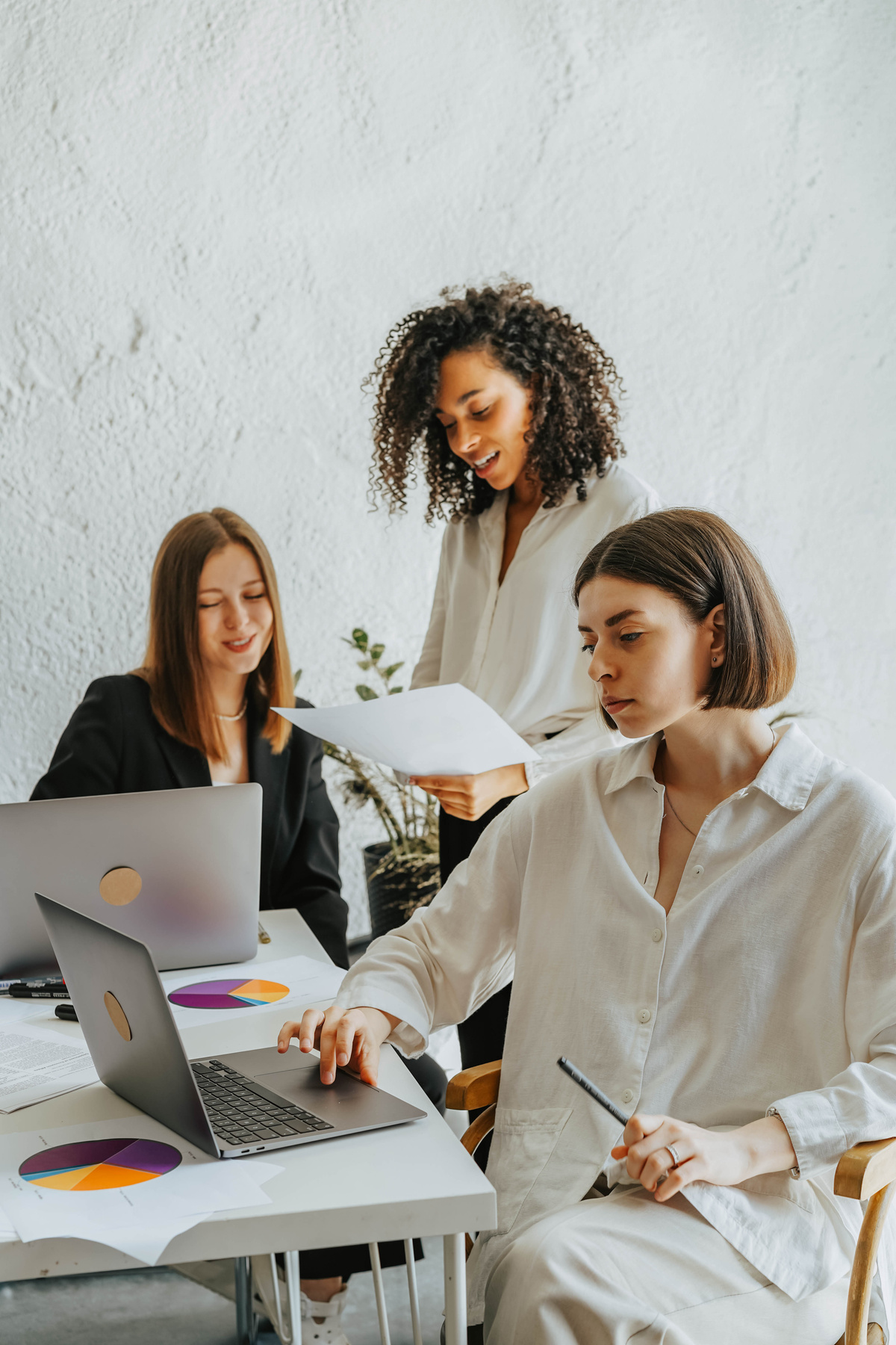 A Group of Women Working Together