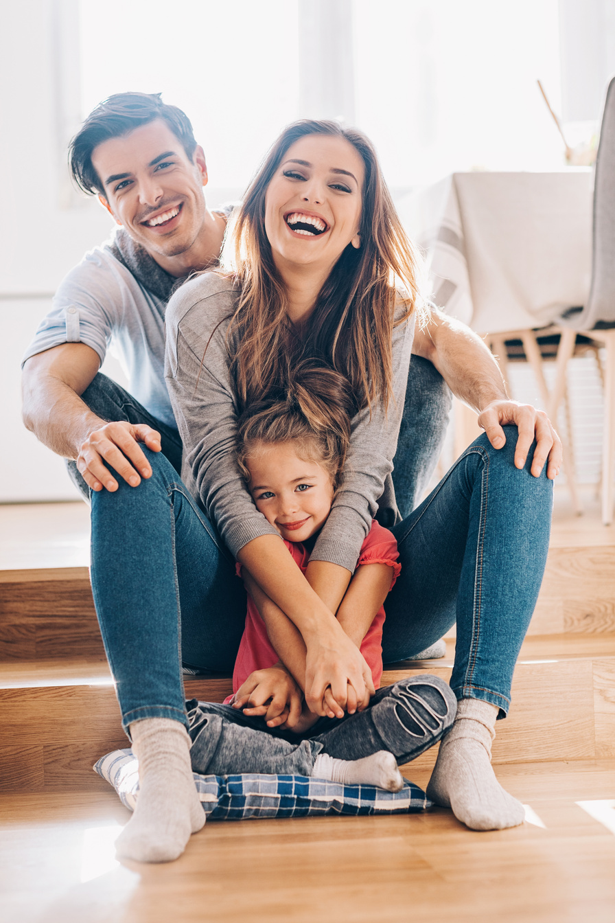 Happy young family at home