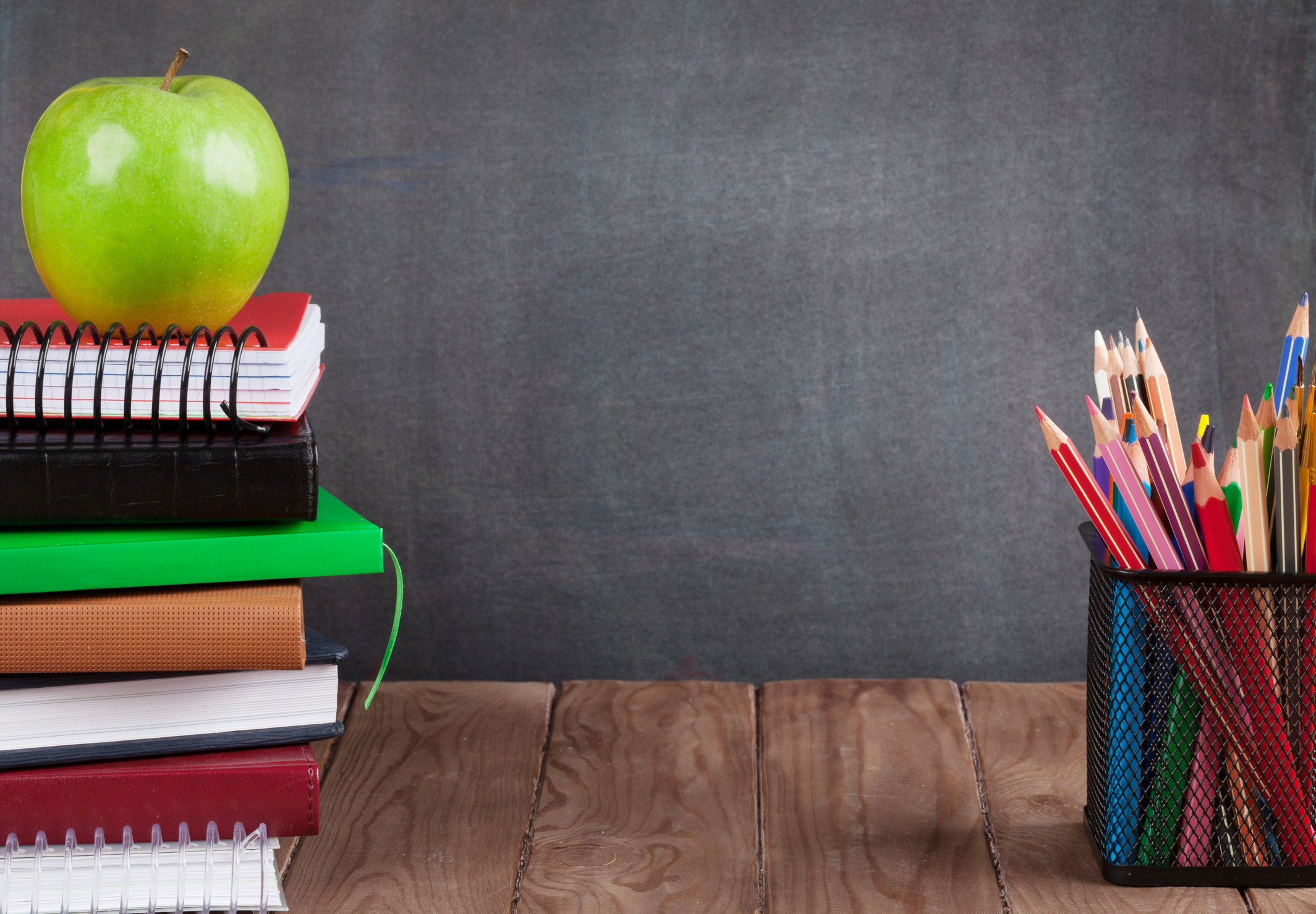 School and office supplies on classroom table